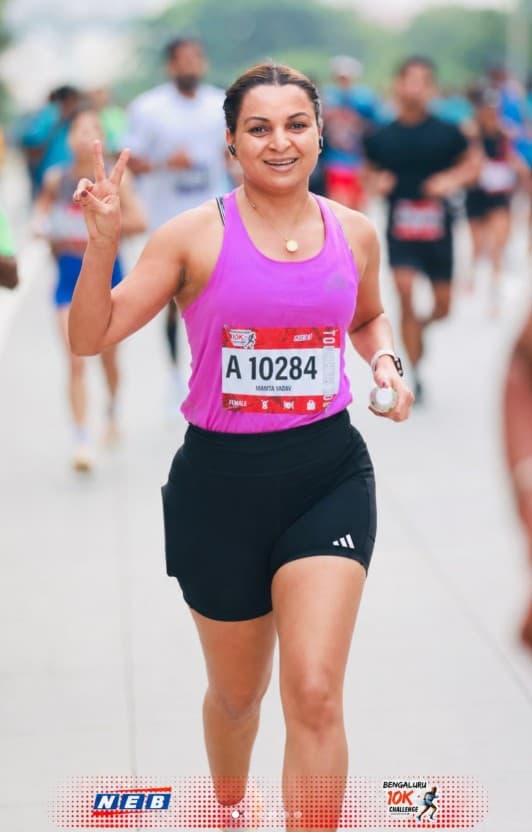 Coach Mamta Yadav racing the Bengaluru 10K Challenge 2026