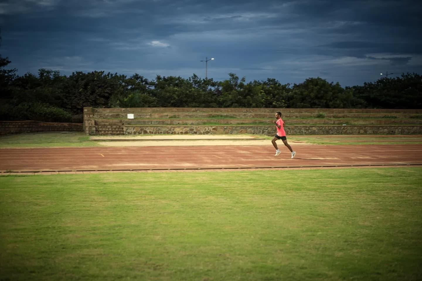 Coach Vikas Srinivasan running on track