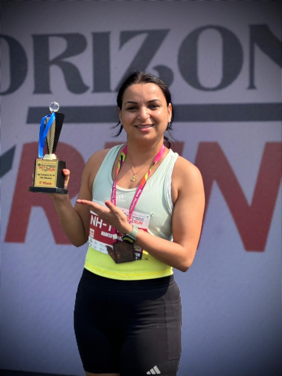 Mamta Yadav with her 1st place trophy at New Horizon Silver Jubilee Run 2026