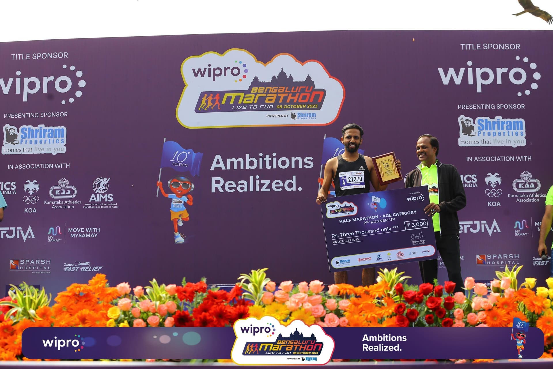 Coach Vikas on the Podium